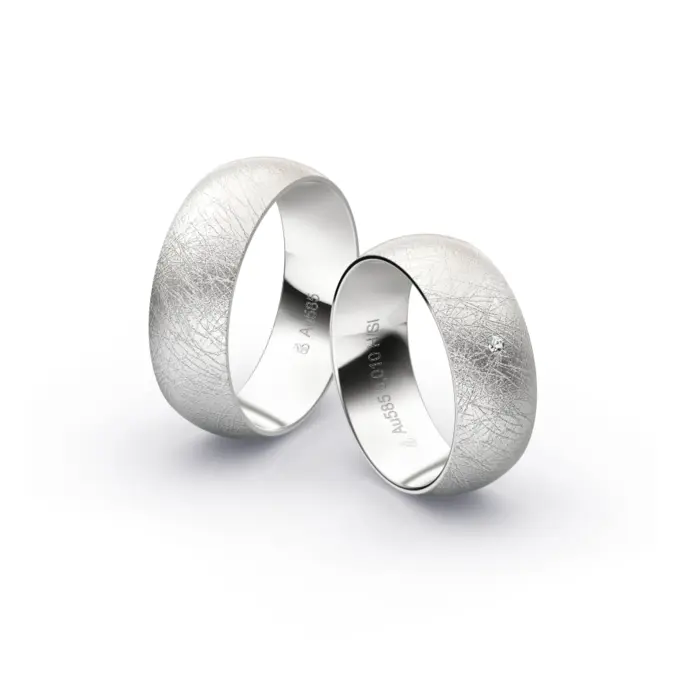Weissgold Eheringe mit Diamanten und Eismattierung in 7 mm Breite 