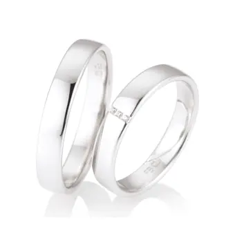Weißgold Eheringe mit 3 Diamanten und Polierung in 4 mm