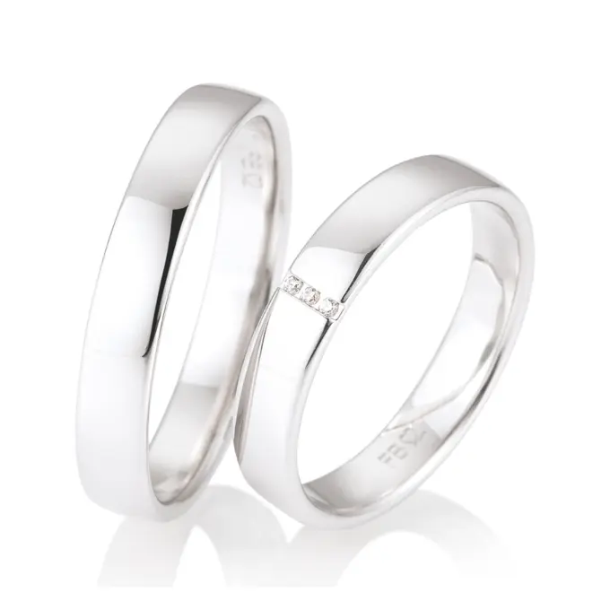 Weißgold Eheringe mit 3 Diamanten und Polierung in 4 mm