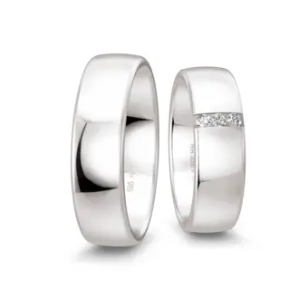 Weißgold Eheringe poliert in 6,5 mm Breite mit drei Diamanten