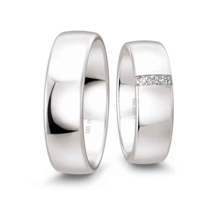 Weißgold Eheringe poliert in 6,5 mm Breite mit drei Diamanten