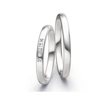 Polierte Weißgold Eheringe mit 5 weißen Diamanten einzeln gefasst