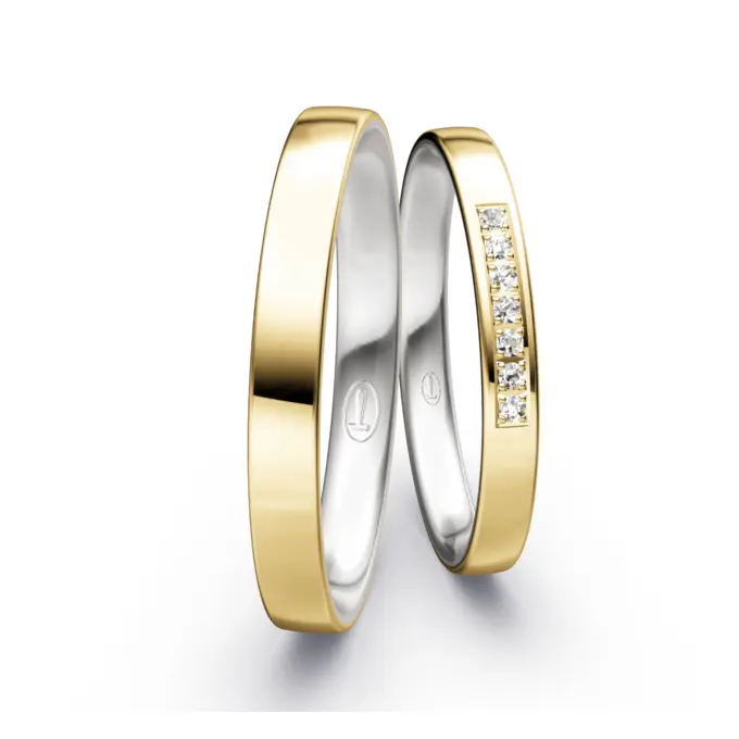 Schmale Weißgold und Gelbold Eheringe mit 7 Diamanten