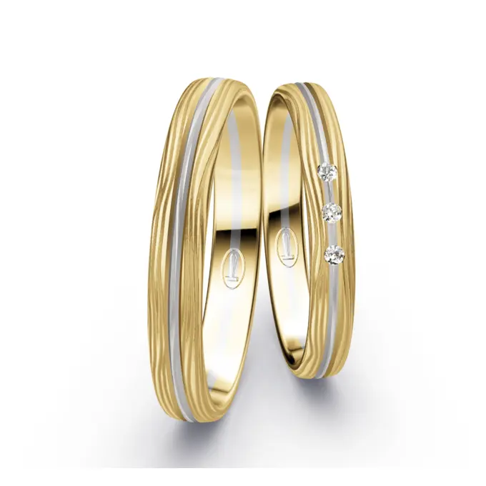 Strukturierte Weißgold und Gelbold Eheringe mit 3 Diamanten