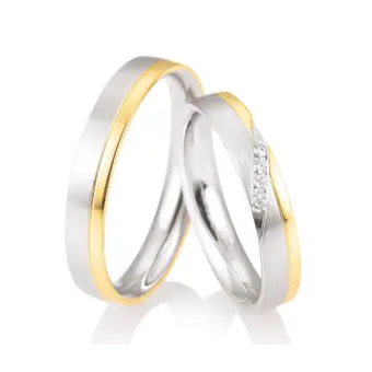 Bicolore Weiß&Gelbgold Eheringe mit 4 Diamanten mit je 0,02 Karat seitlich