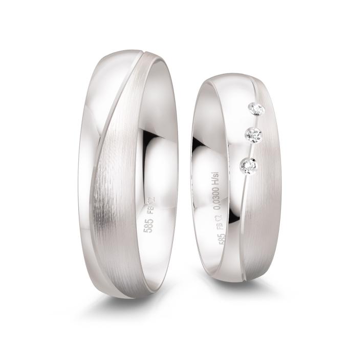 Trauringe aus Weissgold mit 3 Diamanten und Polierung und Mattierung und Rille