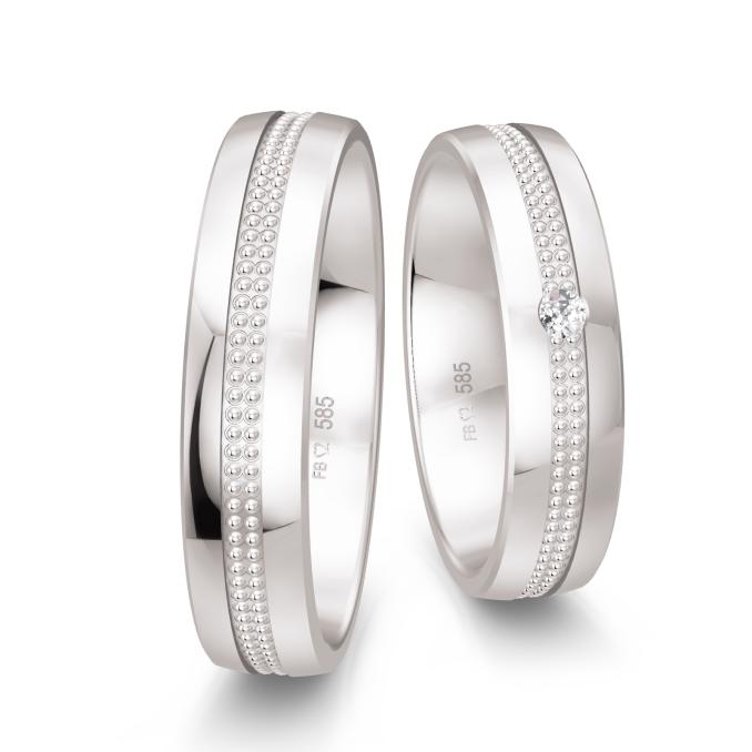 Eheringe aus Weißgold mit Mittelstreifen aus Millgriff und Diamanten