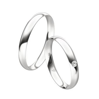 Schmale Eheringe aus poliertem Weißgold mit Diamanten