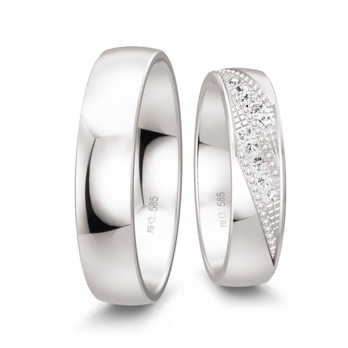 Polierte Eheringe aus Weißgold mit Design aus Millgriff und Diamanten