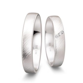 Quermattierte Trauringe aus Weißgold mit 3 Diamanten in Vertiefung
