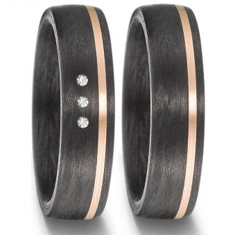 Schöne Trauringe aus Carbon mit drei Diamanten und Roségoldakzent 8926906