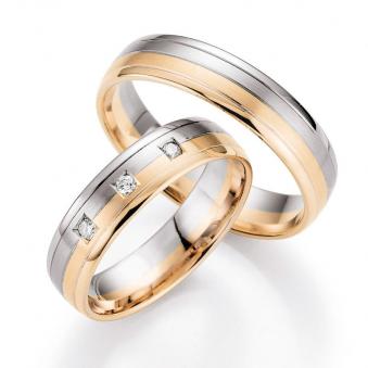 Aufnahme von Palladium 500/Rosègold Eheringe mit polierten Rändern und 3 weißen Steinen 