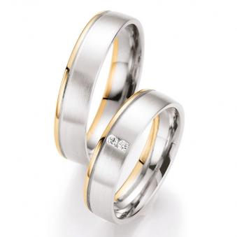 Aufnahme von Weißgold/Rotgold Eheringe mit Rille und 2 senkrecht gesetzten Steinen 