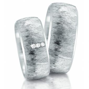 Hervorstechende Partnerringe Eheringe aus Edelstahl von Hand strukturiert mit Brilliant 59309/002/00