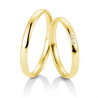 Aufnahmne von Eheringen aus Gelbgold mit drei Diamanten in Polierung