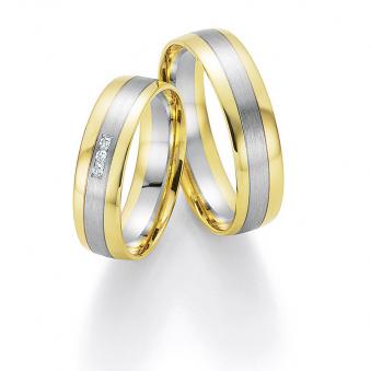 Aufnahme von Eheringen aus Palladium & Gelbgold mit Diamanten im bicoloren Design