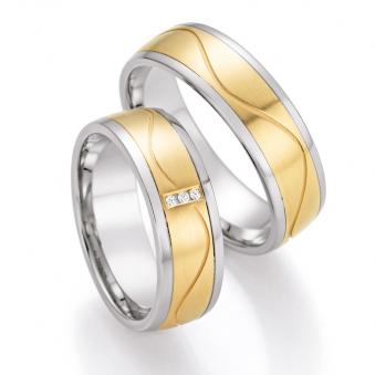 Aufnahme von Stahl&Gelbgold Eheringen mit Diamanten und gewundenem Rillen