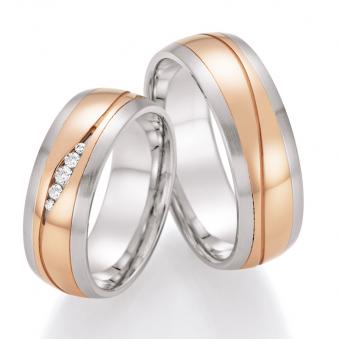 Aufnahme von Stahl&Rotgold Eheringen mit fünf Diamanten in sandmattem Rillen und matten Rändern