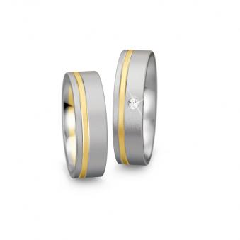 Aufnahme von Titan Eheringen mattiert mit Gelbgoldstreifen und Brillianten