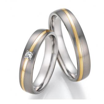 Schmale Titan & Gelbgold Trauringe mit großem Diamanten 4560117