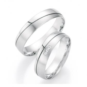 Aufnahme von Eheringe aus Platin mit 3 Diamanten mit Polierung und Mattierung