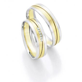 Aufnahme von Eheringen aus Weiß- & Gelbgold mit Diamanten und bicolorem Design 