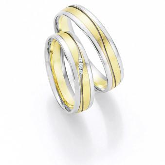 Aufnahme von Fair Trade Eheringen aus Palladium&Gelbgold mit sandmatter Rille und Diamanten 