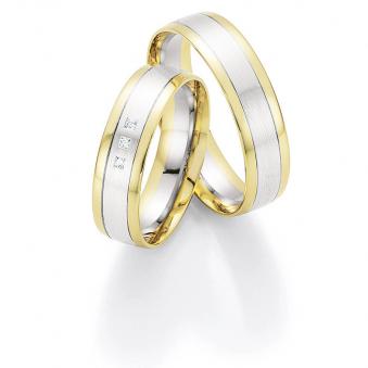 Aufnahme von bicoloren Eheringen aus Weissgold & Gelbgold mit polierten Rändern