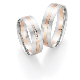 Aufnahme von Eheringen aus Weissgold und Roségold mit Diamanten und matter Oberfläche
