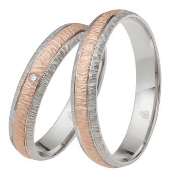 Aufnahme von außen gerundeten Rosé&Weissgold Eheringen mit Diamanten und Strukturierung