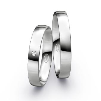 Platin Eheringe mit klassischer Polierung und Diamanten