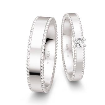 Trauringe aus Silber 925 mit großem Labor-Diamanten und Muster am Rand