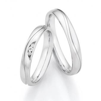 Eheringe aus925er Silber mit drei Diamanten und welliger Rille