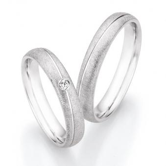 Eheringe aus Silber mit Eismattierung und Diamant