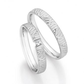 Eheringe aus Silber mattem Strukturdesign und Diamant