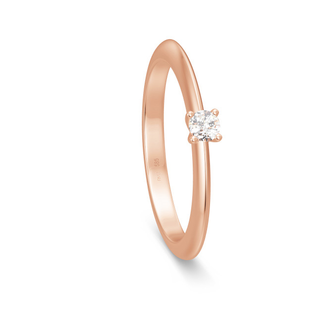 Aufnahme von einem Antragsring mit gewölbter Form aus Rotgold mit Diamanten 