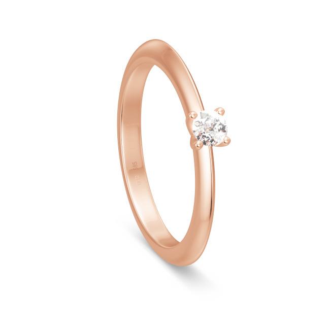 Aufnahme von einem Antragsring aus Rotgold mit Diamanten in klassischer Gestaltung 